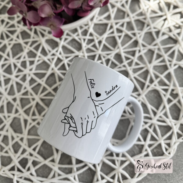 Partnertasse Händchen halten